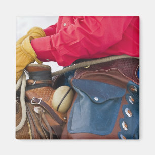 Aimant Cow-boy à cheval portant des chaps en cuir