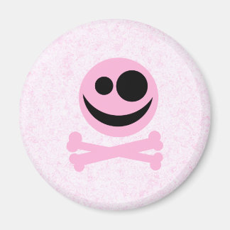 Aimant Crâne rose et noir, sur un Motif rose.