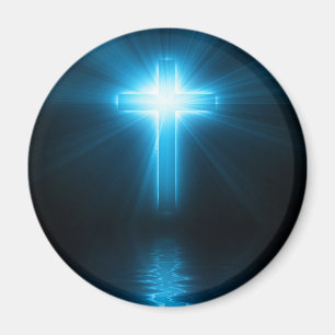 Aimant Croix chrétienne dans la lumière bleue
