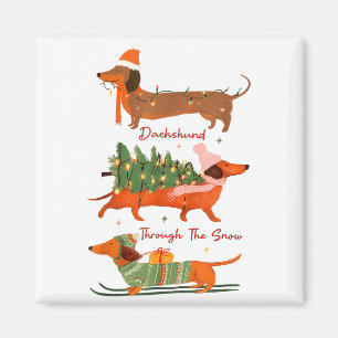 Aimant Dachshund à travers la neige Joyeux Noël Dachshu