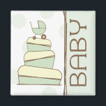Aimant de gâteau pour bébé vert<br><div class="desc">Aimant illustrant un gâteau baby shower avec une palette de couleurs verte, brune et crème et un chariot bébé vert assorti au dessus. Le côté droit est vert avec garniture brune. Texte Brown : "BÉBÉ". L'Arrière - plan est un pois vert pur. Idéal pour une faveur baby shower. Recherchez les...</div>