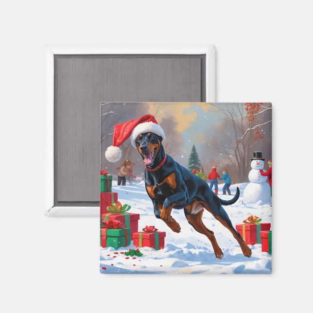 Aimant Doberman courant dans la neige avec un chapeau de  (Recto/Verso)