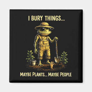Aimant Enterrer des choses peut-être des plantes peut-êtr