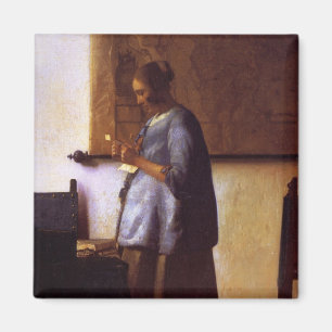 Aimant Femme dans le bleu lisant une lettre