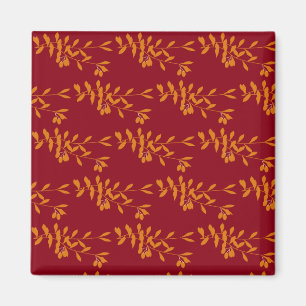 Aimant Feuilles de branches de silhouette orange sur roug