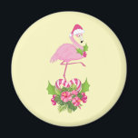 Aimant Flamant rose rose à Santa Hat Noël Whimsical<br><div class="desc">Un aimant avec un flamant de Noël à thème tropical portant un chapeau de santa rose. Sous ses pieds se trouve un bouquet de sucre de canne avec de jolies fleurs tropicales et des baies roses. Un bourgeon de saint sur sa poitrine.</div>