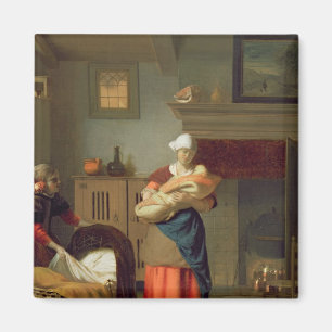 Aimant Gouvernante avec le bébé dans un intérieur