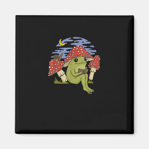 Aimant Grenouille fan de livre avec chapeau de champignon