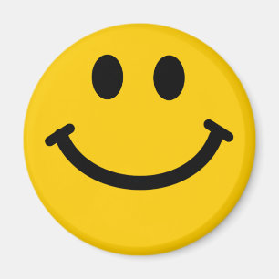 Aimant heureux jaune de visage