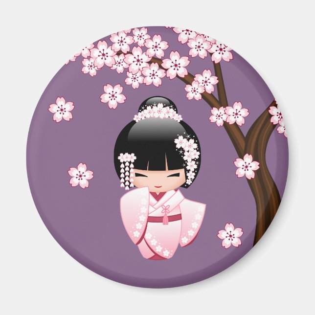 Aimant Kokeshi Doll en kimono rose sur fond rond violet (Devant)