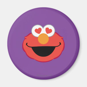Aimant Le visage souriant d'Elmo avec les yeux en forme d