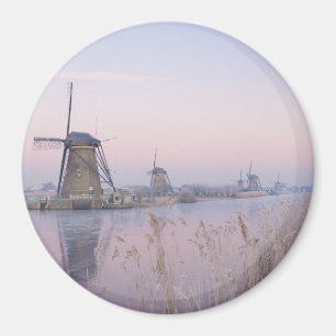 Aimant Lumière du lever du soleil en hiver sur les moulin