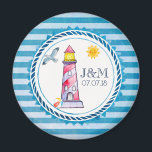 Aimant Mariage de phare à aquarelle rouge<br><div class="desc">A wedding aimant with nautical theme. Designed on a blue striped pattern and a circulaire nautical frame layered over top. A red striped lighthouse and a beach ball,  with a smiling sun and seagull flying off in the distance positionned inside the frame. Personalize with your initials and wedding date.</div>