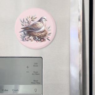 Aimant Nid de colombe rose avec fleurs et branches d'oliv