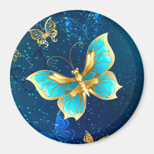 Aimant Papillons d'or sur un Arrière - plan bleu