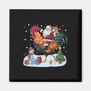 Aimant Père Noël à cheval sur un poulet drôles de lumière