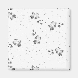 Aimant photo en noir et blanc d'un tas de points