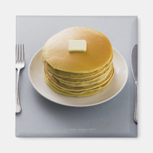 Aimant Pile de crêpes avec du beurre d'un plat
