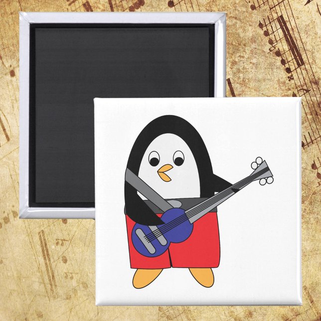 Aimant Pingouin Jouer de la basse guitare (A magnet with a cute penguin playing the bass guitar.)