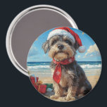 Aimant Pointeur à poils durs Griffon Dog Christmas Beach<br><div class="desc">Apportez la chaleur des vacances à la plage avec ce charmant design d'inspiration vintage avec un chien festif assis sur une plage sereine. Avec une touche de vacances classique aux tons nostalgiques et aux ambiances côtières, cette oeuvre capture la magie de Noël au bord de la mer. Parfait pour répandre...</div>