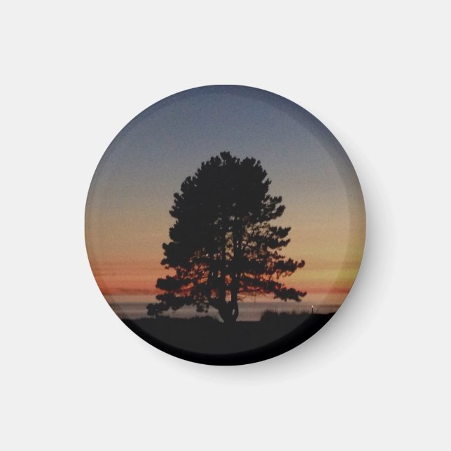 Aimant rond avec coucher de soleil de silhouette d (Devant)