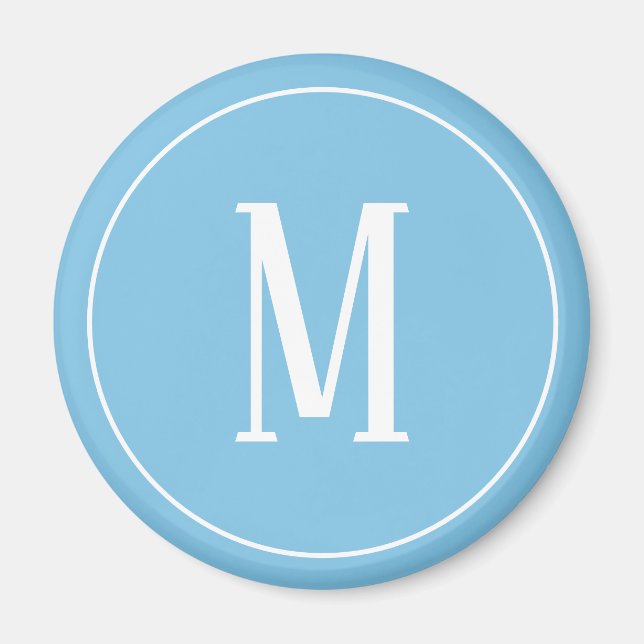 Aimant Rond Monogramme Blanc sur Fond Bleu Clair (Devant)