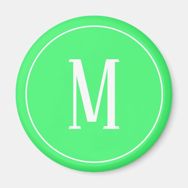 Aimant Rond Monogramme Blanc sur Fond Vert Clair (Devant)