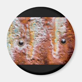 Aimant rouille des yeux métalliques