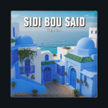 Aimant Sidi Bou Dit Que Tunisie Voyage<br><div class="desc">Sidi Bou Saïd est un village côtier pittoresque en Tunisie, réputé pour son architecture bleue et blanche saisissante, ses rues pavées et ses vues imprenables sur la mer Méditerranée. Située à seulement 20 kilomètres de la capitale Tunis, cette charmante ville est perchée sur une colline, offrant des vues panoramiques qui...</div>