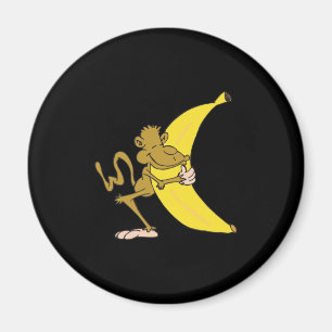 Aimant singe serrant une banane dans ses bras