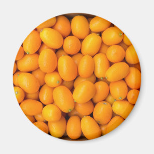 Aimant Tas des kumquats oranges dans la boîte en carton