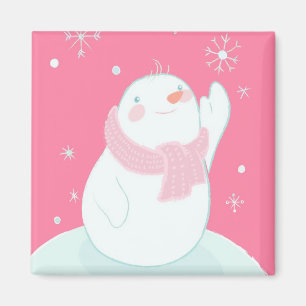 Aimant Un bonhomme de neige qui atteint un flocon de neig