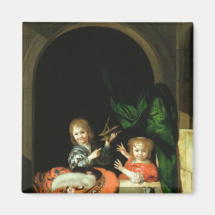 Aimant Un chat qui regarde deux garçons