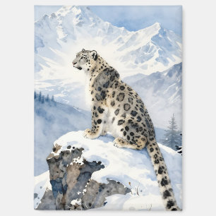 Aimant Un léopard des neiges sur un pic enneigé