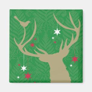 Aimant Une silhouette d'un cerf aux étoiles suspendues à 