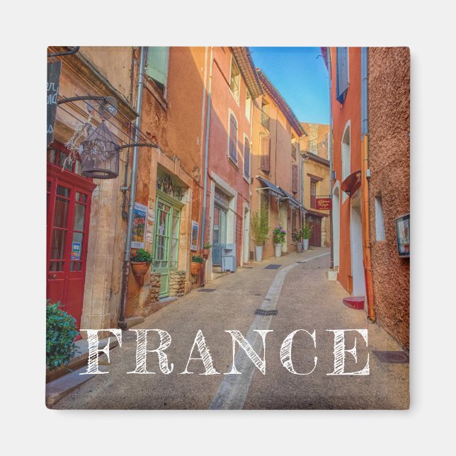 Aimant Ville française colorée sur une colline (Devant)