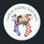 Aimant Vintage Christmas Stockings with Cute Children<br><div class="desc">Vintage illustration Merry Christmas holiday design featuring twins kids hanging in Christmas stockings decorated with holly leaves and berries. The girl is in the blue and white striped stocking and the boy is in the red and white striped stocking. Silly,  funny and humorous image,  great for the whole family!</div>