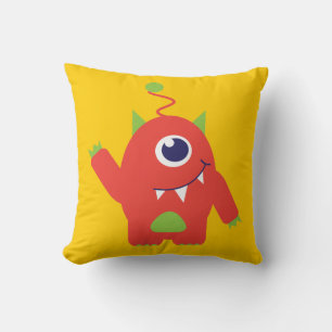 Alien aux yeux orange et jaune coussin pour enfant