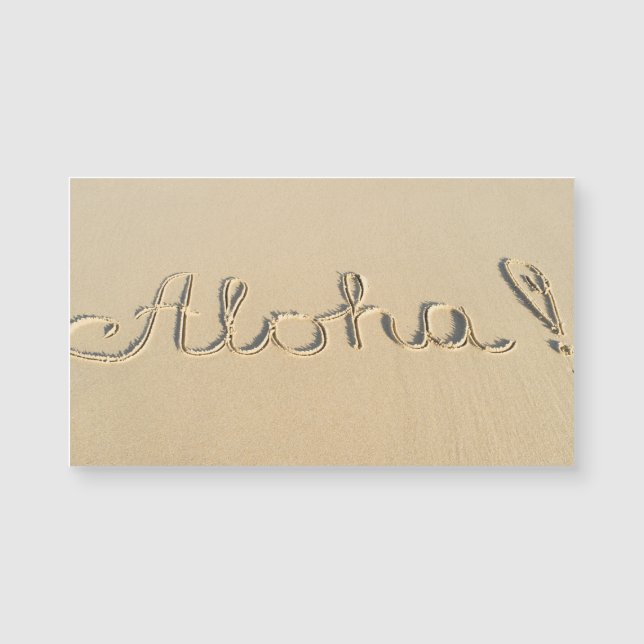 Aloha signe sur le sable de la plage (Devant)