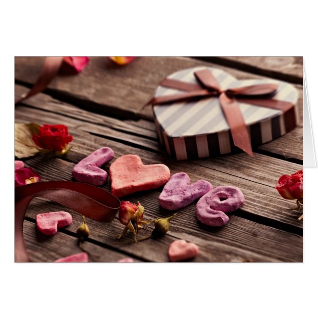 Amour de mot avec le cadeau en forme de coeur de (Devant horizontal)