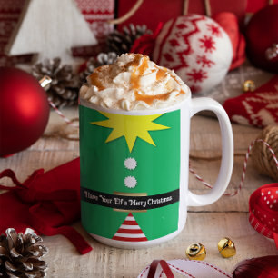 Amusez votre elfe dans une jolie tasse de Noël