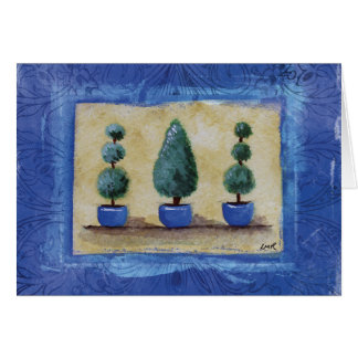 Arbres topiaires avec la frontière bleue