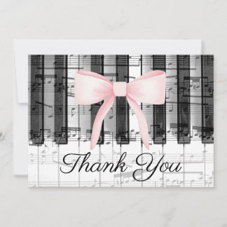 arc rose merci calligraphie sur piano musique