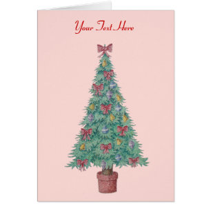 arcs rouges et cloches sur arbre décoré pour noël