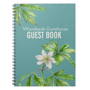 Art floral de région boisée et carnet de livre