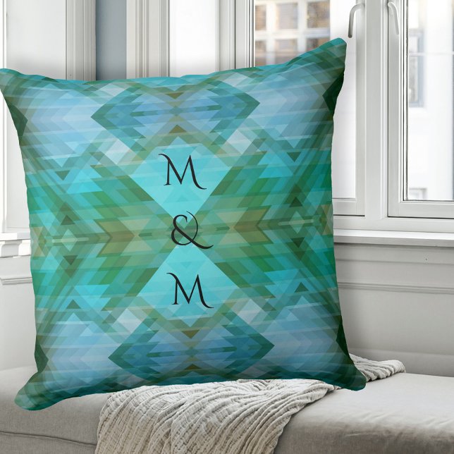 Artistes Artistes Motif géométrique Coussin (Pillow featuring a geometric Aztec inspired pattern in mint, teal, turquoise with monogram)