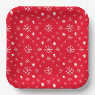 Assiette en papier rouge avec flocons de neige bla