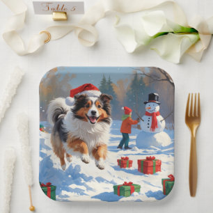 Assiettes En Carton Berger des Shetland courant dans la neige avec un