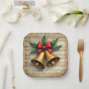 Assiettes En Carton Cloches de Noël sur une partition musicale,