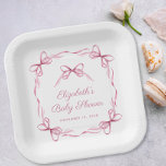 Assiettes En Carton Coquette Élégante Bows Rose Baby Girl Douche<br><div class="desc">De mignonnes plaques en papier pour votre douche pour bébé fille, qui présentent un cadre rose de délicats rubans d'aquarelle et des arcs de coquette, mélangeant une esthétique minimale avec une touche de charme vintage. Les mots "Baby shower" et le nom de la future mère sont présentés dans un élégant...</div>